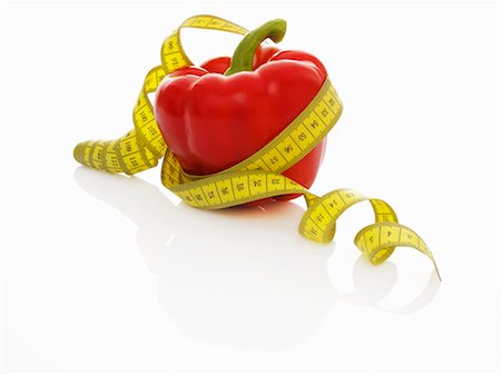 simsearch:659-07029044,k - A red pepper with a tape measure Stock Photo - Premium Royalty-Free, Code: 659-06184406