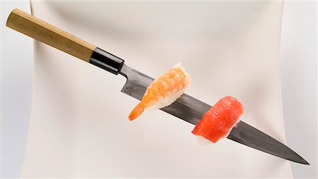 simsearch:659-07610354,k - Prawn and salmon nigiri on a sushi knife Stock Photo - Premium Royalty-Free, Code: 659-06184699