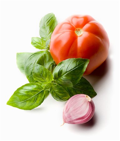 Tomato, basil and garlic clove Stock Photo - Premium Royalty-Free, Code: 659-06185015