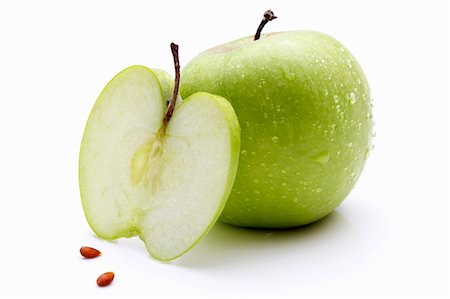 simsearch:659-07610418,k - Granny Smith apples (whole, slice and pips) Stock Photo - Premium Royalty-Free, Code: 659-06185386