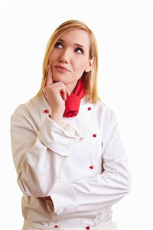 Thoughtful blond female chef in work clothes Stock Photo - Premium Royalty-Free, Code: 659-06185440