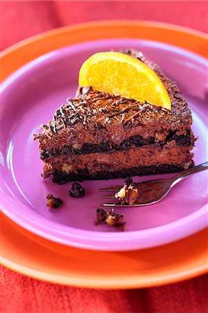 simsearch:659-01848790,k - Piece of chocolate mousse cake with a slice of orange Stock Photo - Premium Royalty-Free, Code: 659-06185492