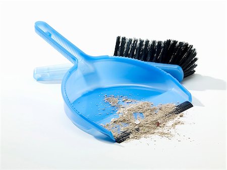 Dustpan and brush with floor sweepings Stock Photo - Premium Royalty-Free, Code: 659-06185566