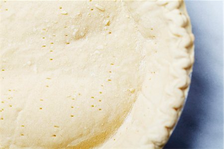 simsearch:659-06188604,k - Pie Crust with Fork Holes Poked in the Bottom Stock Photo - Premium Royalty-Free, Code: 659-06185685