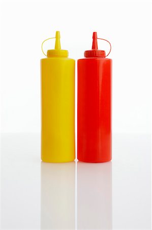 Plastic mustard and ketchup bottles Foto de stock - Sin royalties Premium, Código: 659-06185751
