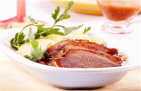 simsearch:659-01857024,k - Roast goose breast with gravy and potatoes Stock Photo - Premium Royalty-Free, Code: 659-06186190