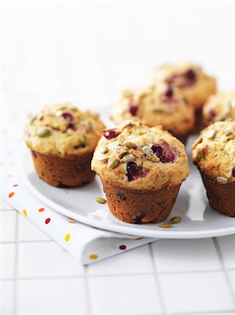 Cranberry muffins with sunflower seeds Foto de stock - Sin royalties Premium, Código: 659-06186200