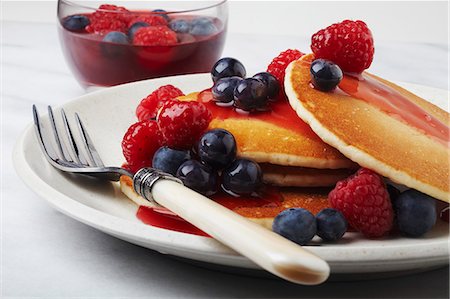 pancake - Pancakes Topped with Berry Syrup Stock Photo - Premium Royalty-Free, Code: 659-06186498
