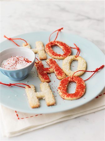 sugar - Letter-shaped Christmas biscuits with sugar Stock Photo - Premium Royalty-Free, Code: 659-06186775