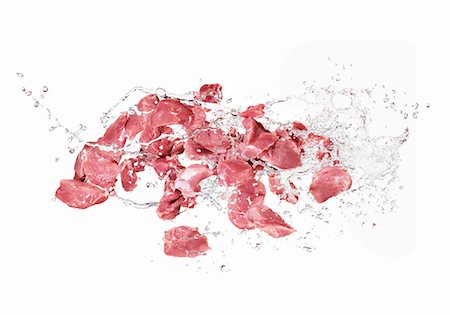 fresh meat - Pork and a splash of water Stock Photo - Premium Royalty-Free, Code: 659-06187097