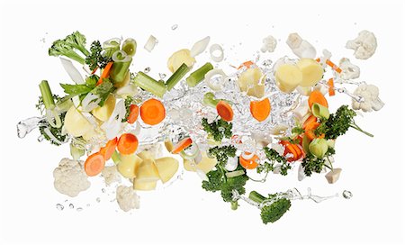 simsearch:659-06154334,k - Mirepoix and herbs with a splash of water Stock Photo - Premium Royalty-Free, Code: 659-06187104