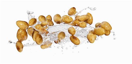 simsearch:659-06154334,k - Potatoes and a splash of water Stock Photo - Premium Royalty-Free, Code: 659-06187110