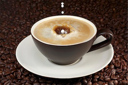 dropped - Milk dropping into coffee Stock Photo - Premium Royalty-Free, Code: 659-06187471