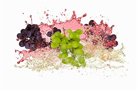 Red and green grapes with wine splash Stock Photo - Premium Royalty-Free, Code: 659-06187671