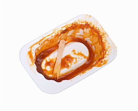 Empty container with currywurst remains in it Stock Photo - Premium Royalty-Free, Code: 659-06188032