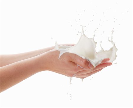 silhouette hand - Hands with a milk splash Foto de stock - Sin royalties Premium, Código: 659-06188062