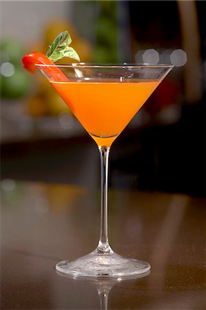 simsearch:652-03802277,k - The Smoking Gun; Rum Cocktail with Grapefruit Twist; Red Pepper Garnish Stock Photo - Premium Royalty-Free, Code: 659-06188224