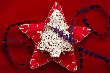 felt - A chocolate Christmas tree on a felt star Stock Photo - Premium Royalty-Free, Code: 659-06183978