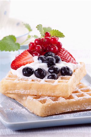 Waffles with Blueberries and Raspberries and Whipped Cream Stock Photo - Premium Royalty-Free, Code: 659-06306222
