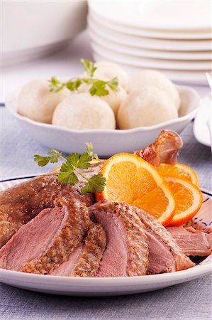 simsearch:659-01857024,k - Roast goose with dumplings and oranges Stock Photo - Premium Royalty-Free, Code: 659-06306240