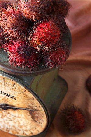 simsearch:659-06306291,k - Whole Rambutans on an Old Scale Stock Photo - Premium Royalty-Free, Code: 659-06306279