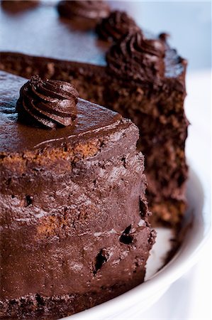 simsearch:659-06373404,k - Chocolate cake, sliced (close-up) Stock Photo - Premium Royalty-Free, Code: 659-06306417