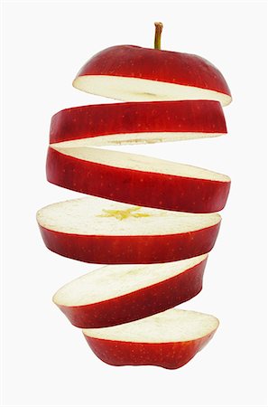 fly - Flying slices of red apple Stock Photo - Premium Royalty-Free, Code: 659-06307073