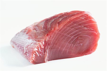simsearch:659-03535097,k - A skinned, fresh tuna fillet Foto de stock - Sin royalties Premium, Código: 659-06372808