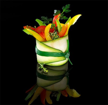 strip - Colourful pepper sticks and parsley wrapped in a courgette slice Stock Photo - Premium Royalty-Free, Code: 659-06372853