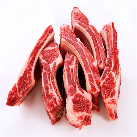 rib - Raw Beef Ribs on a White Background Foto de stock - Sin royalties Premium, Código: 659-06372933