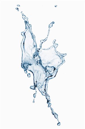 dripping - A splash of water against a white background Stock Photo - Premium Royalty-Free, Code: 659-06373016