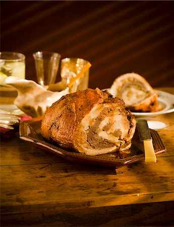 roast - Turducken on a Platter on Wooden Table Stock Photo - Premium Royalty-Free, Code: 659-06494337