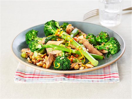 fish plate - A plate of salmon with broccoli, nuts and orange zest Stock Photo - Premium Royalty-Free, Code: 659-06494667