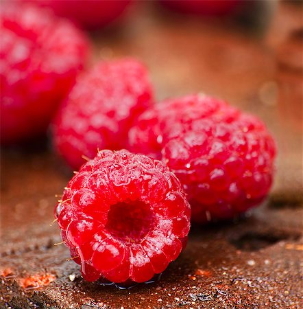 raspberry - Wet raspberries (close-up) Stock Photo - Premium Royalty-Free, Code: 659-06494924