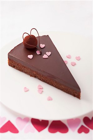 A slice of chocolate cake for Valentine's Day Stock Photo - Premium Royalty-Free, Code: 659-06495564