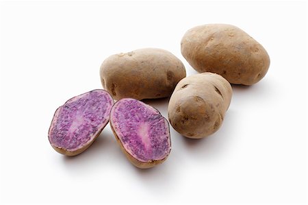 raw potato - Blauer Schwede potatoes Stock Photo - Premium Royalty-Free, Code: 659-06670951