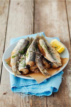seasoning - Fried herring with salt and lemon Stock Photo - Premium Royalty-Free, Code: 659-06671077
