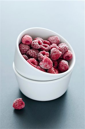 raspberry - A ramekin of frozen raspberries Stock Photo - Premium Royalty-Free, Code: 659-06671221