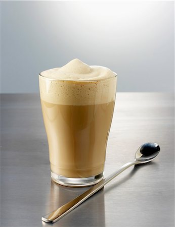 Stirred latte macchiato with spoon Stock Photo - Premium Royalty-Free, Code: 659-06671463