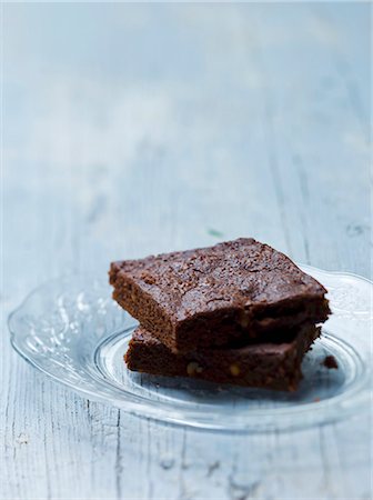 stack of plates - Two brownies on a glass plate Stock Photo - Premium Royalty-Free, Code: 659-06671568