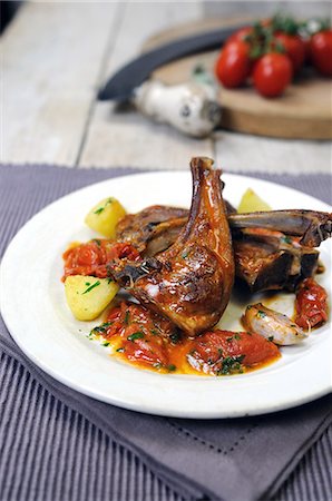 simsearch:659-08148038,k - Lamp chops with tomatoes and olive sauce Stock Photo - Premium Royalty-Free, Code: 659-06901362