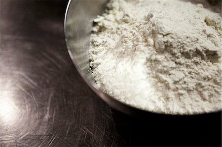 Wheat flour in a mixing bowl Stock Photo - Premium Royalty-Free, Code: 659-06902792