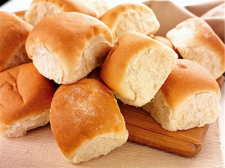 Lots of rolls on a chopping board Stock Photo - Premium Royalty-Free, Code: 659-06903378