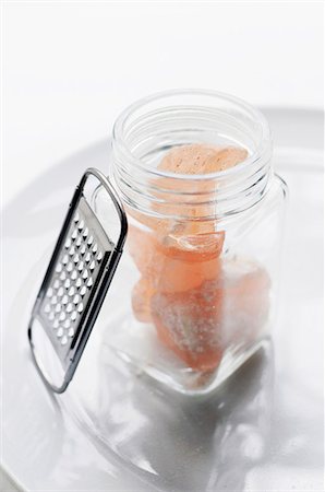 simsearch:659-07027183,k - A Small Open Jar of Pink Rock Salt with a Grater Stock Photo - Premium Royalty-Free, Code: 659-07026793