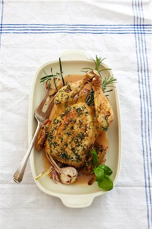 roast - Roast chicken with garlic and rosemary Stock Photo - Premium Royalty-Free, Code: 659-07027394