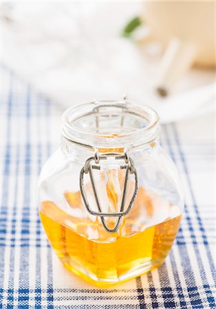 simsearch:659-07027183,k - Pale Scandinavian sugar beet syrup in a jar Stock Photo - Premium Royalty-Free, Code: 659-07027524