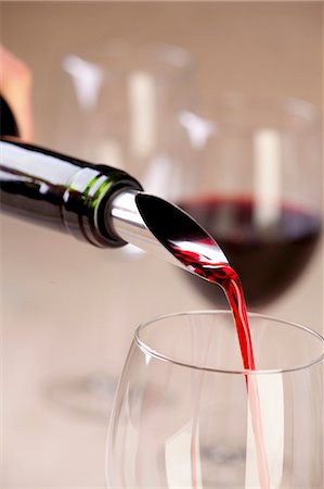 red wine people - Red wine being poured into a glass Stock Photo - Premium Royalty-Free, Code: 659-07028090