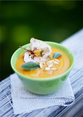 seasoning - Cream of squash soup with apple crisps and pumpkin seeds Stock Photo - Premium Royalty-Free, Code: 659-07028381