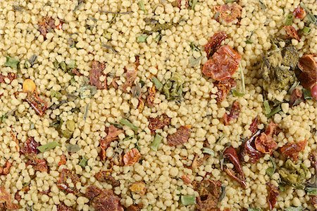 simsearch:659-06187957,k - A ready-made mix of couscous with dried vegetables and spices Photographie de stock - Premium Libres de Droits, Code: 659-07028488
