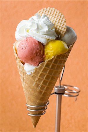simsearch:659-08418689,k - Fruit ice cream with cream in a wafer cone Stock Photo - Premium Royalty-Free, Code: 659-07028684